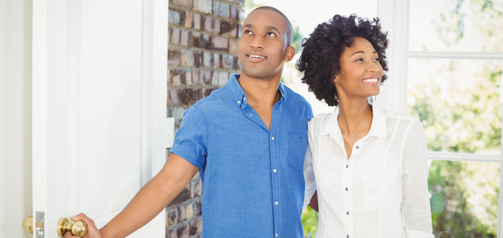 Couple Walking Into Open House